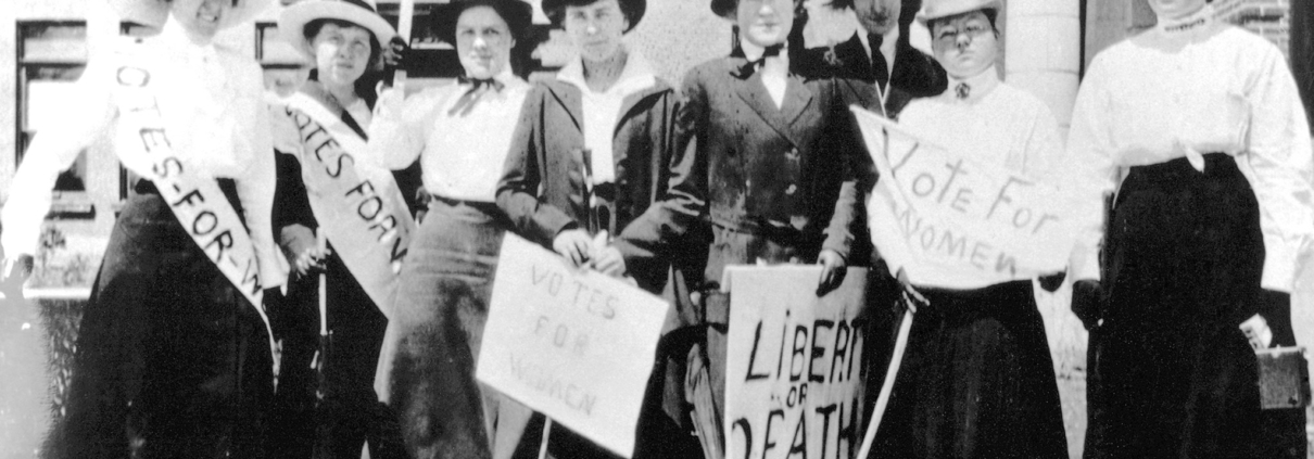 Women holding signs