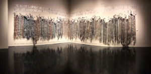Wire hair and poetry sculpture