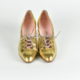 Leather shoes with gold finish and silver high heels and laces