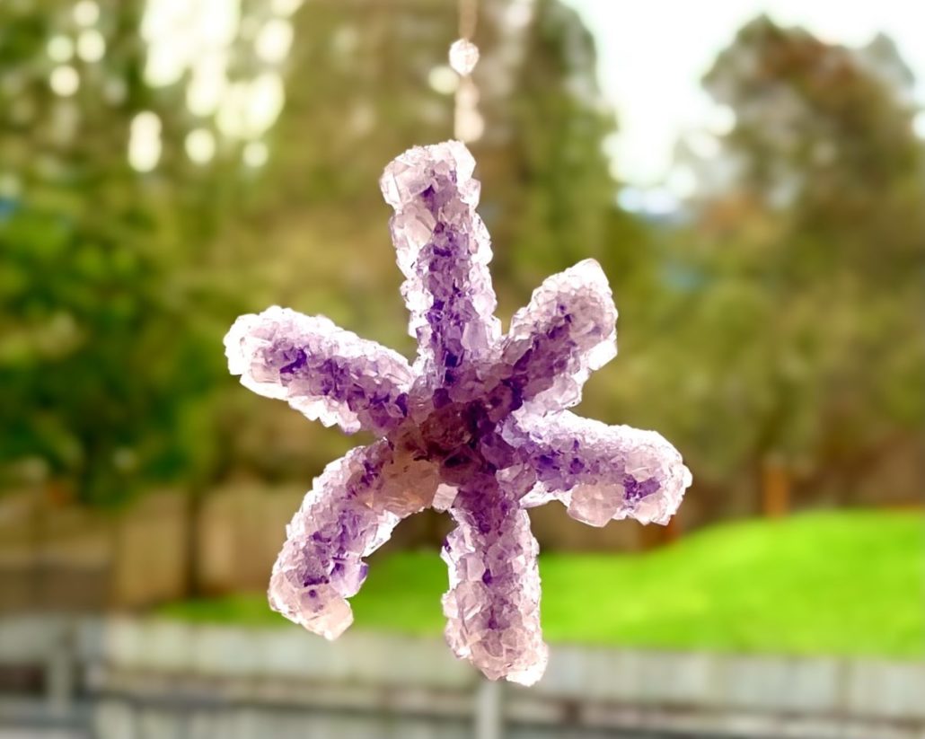 Snowflake made of purple crystals